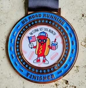 NATIONAL HOT DOG MONTH Virtual 5K, 10K, 13.1M, & 26.2M (July 2026) logo