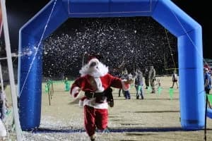 Green Wave Jingle Jam 5k 2026 logo