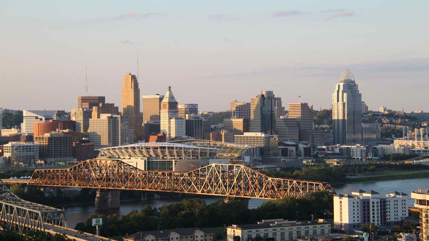 The Cincinnati skyline and Ohio River bridges at dusk, Ohio.